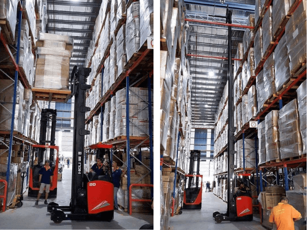 Xe nâng reach truck ngồi lái 2 tấn làm việc trong kho